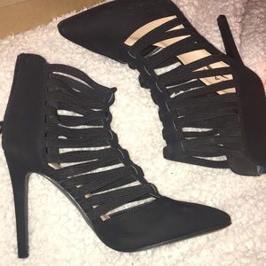 Strapped black heels